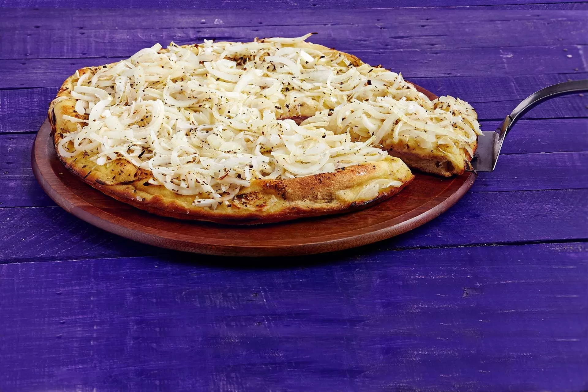 Receta de domingo: pizza fugazetta rellena de muzarella para compartir